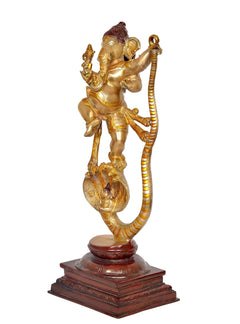 Dancing Lord Ganesha brass idol on circular serpent Shesha hood base