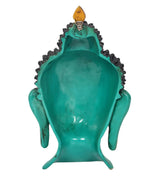 Back view of turquoise resin Buddha mask wall hanging with black curly hair and legs
