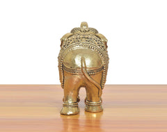 Bronze elephant figurine, back view with carved head details and patterned ankles