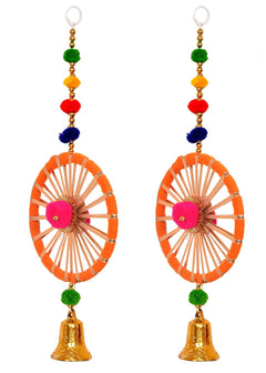 Two door toran latkans with orange striped circular discs, pink round center, colorful pom poms, bells