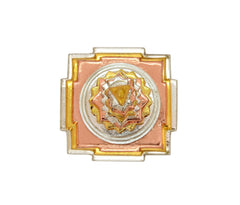 Front view of brass Shri Yantra medallion with detailed star pattern and gold frame