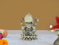 Brass Lord Ganesha idol on lotus, back view, detailed headdress, 3 in