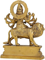 Brass Durga idol statue on lion, tall halo and patterned torso on pedestal