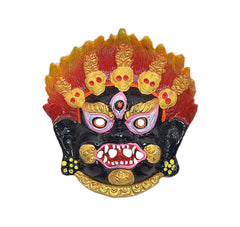 Metal evil eye protection kavach with detailed demon crown and pink-lined eyes