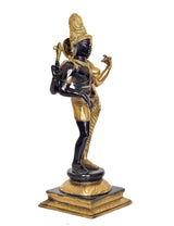 Rear angle of Ardhanrishvara statue, black and gold tones, raised left hand, round pedestal base