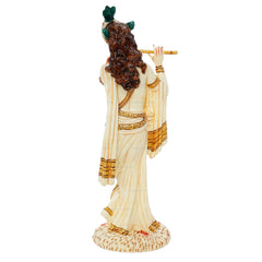 Standing Krishna marble idol side view, long brown hair, flute raised in hand