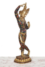 Three-quarter view Tara Devi brass dancing statue, multicolor enamel, raised hands