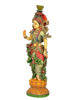 Radha murti idol side view with raised hand gesture, ornate gold jewelry, multicolor dress