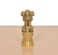 Bronze Ashoka Stambh side view with lion figure and decorative ringed pedestal base.