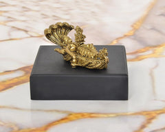 Reclining Vishnu idol on Sheshanaag, gold tone figurine on black base