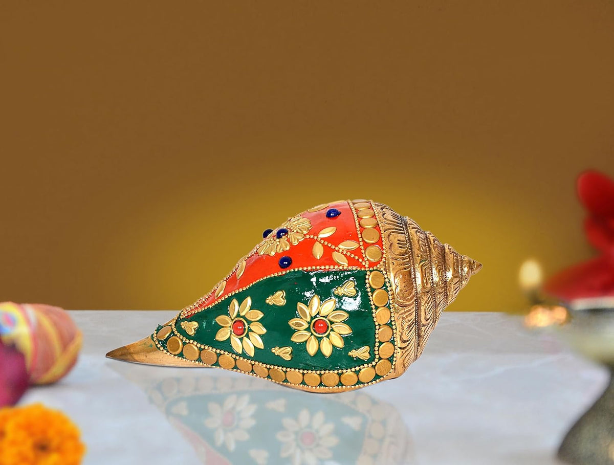 Brass shankh decor figurine with colorful floral inlay, conch-teardrop shape