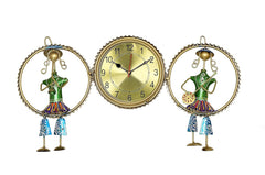 Iron musician wall hanging with gold clock: green figure on left and right, colorful accents