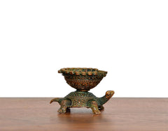 Brass tortoise oil lamp diya statue, small teal-green body with ornate golden accents
