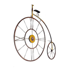 Iron bicycle wall clock, large wheel with yellow center, small wheel at right.