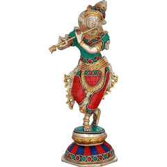 Brass Krishna statue, 9.4 in: standing dancer with flute, green top, red patterned skirt