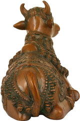 Brass Nandi figurine, back view with engraved horns and textured green-gold robe