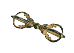 Brass eight-pronged small Dorje, angled view with green handle bands
