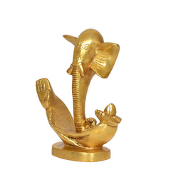 Gold-toned modern Ganesha idol statue, side view with crossed arms and round base