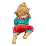 Brass Ganesha statue idol sitting pose, red and teal enamel-like detailing