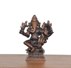 Copper Lord Ganesha seated with Riddhi idol, detailed multi-armed form