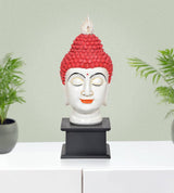 Resin Buddha head statue, red textured headdress, black base
