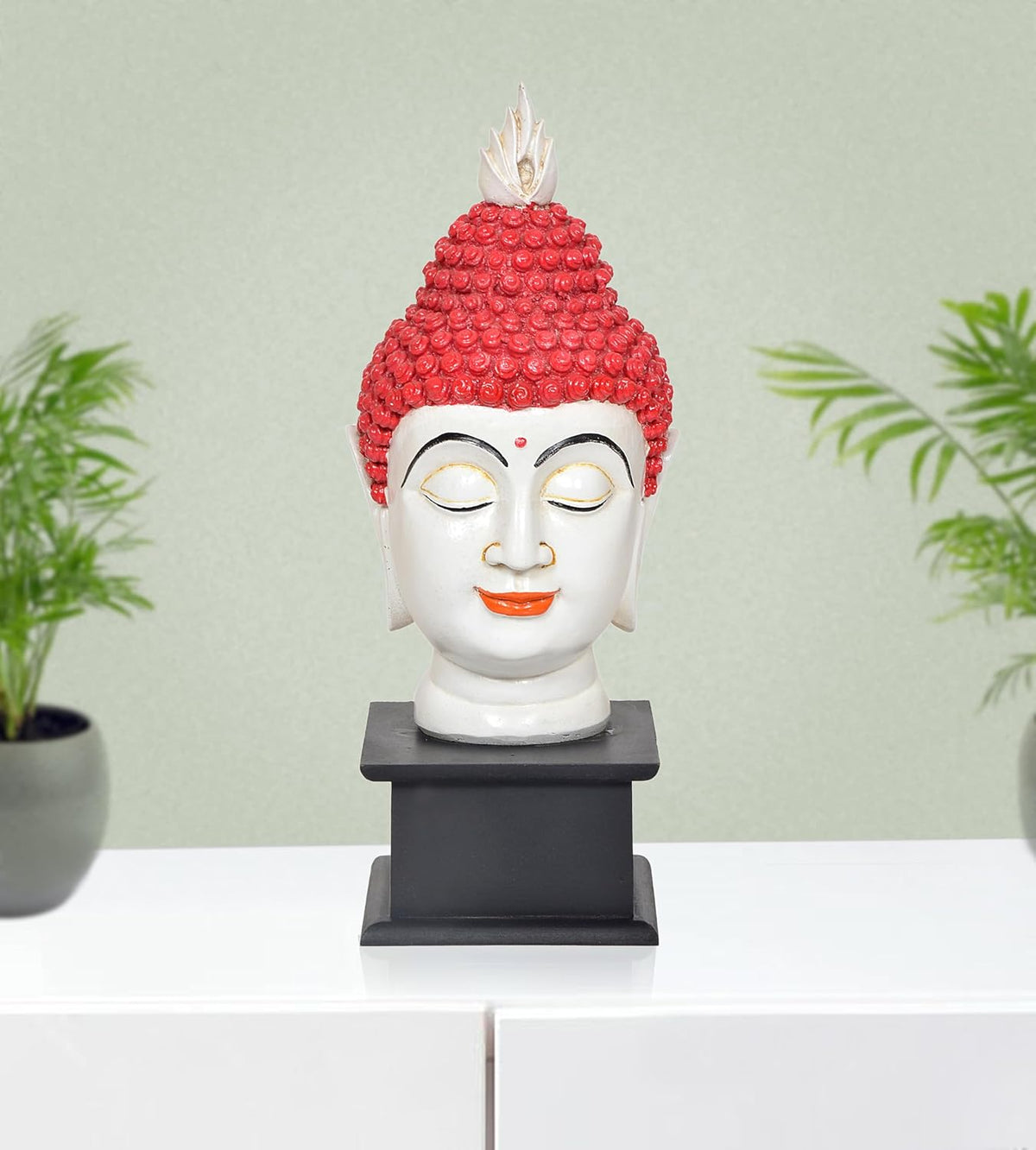 Resin Buddha head statue, red textured headdress, black base