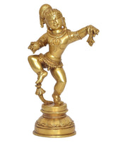 Brass-tone dancing baby Krishna figurine with one leg raised and decorative base