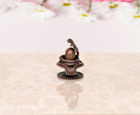 Copper Shiva ling with arched cobra tail, small deity sculpture for puja