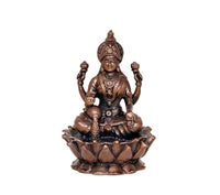 Copper Lakshmi idol murtI statue, front view with raised hands and lotus pedestal