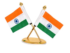 Front view of metal Indian flag ornament—crossed flags on gold base