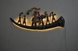 Iron Bharat wall decor showpiece: curved base with multiple characters and warm glow