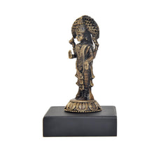 Side view Vasavi Kanyaka Parameshvari idol on dark base with detailed draped ornaments