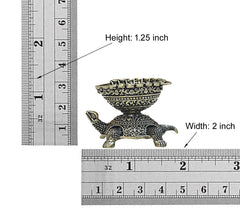 Brass tortoise oil lamp diya size shown: Height 1.25 in, Width 2 in
