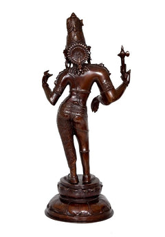 Brass Ardhanarishvara statue idol from behind, tall crown and patterned back detailing
