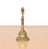 Bronze pooja bell ghanti front view with ornate bell rim and Chakra finial