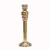 Brass Ashoka stambh showpiece with lion top and round metal base, full view