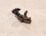 Copper Vishnu-Lakshmi idol on Sheshnag serpent, rear view with fan-like hood