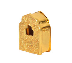 Gold-tone gau box side view with arched opening and engraved decorative front