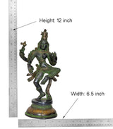 Ardhanrishvara brass statue height 12 inch with width 6.5 inch shown on ruler