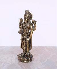 Brass Lord Vishnu idol statue, three-quarter view, detailed jewelry and draped garments
