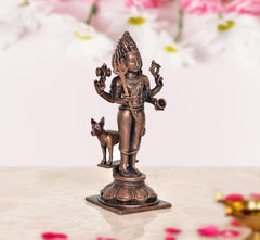 Shree Kal Bhairav idol, copper tone with animal companion near feet, detailed pedestal base
