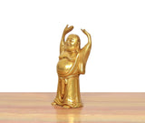 Brass Laughing Buddha statue, side view with arms raised and flowing robe