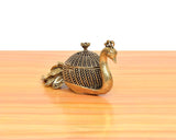 Brass duck & swan showpiece kumkum box with domed lid, textured body, and side peacock