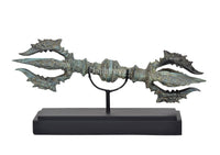Bronze Tibetan Dorje with eight prongs on wooden base, turquoise patina