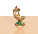 Brass Tirupati Balaji diya (6 inch) profile view; green base with multicolor border beads.
