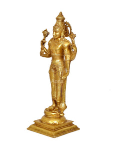 Brass Vishnu statue side view, four arms raised, engraved torso and waist details