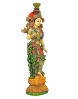 Radha murti idol with gold crown and flowing green-red detailing on dress and base