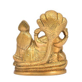 Brass Vishnu and Lakshmi statue, back view showing cobra hood and patterned base