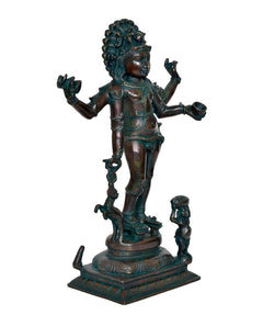 Shiva Bhikshatana idol, teal patina rear angle, raised arms and detailed jewelry