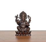 Lord Ganesha brass idol, seated pose with detailed jewelry and lotus base, front